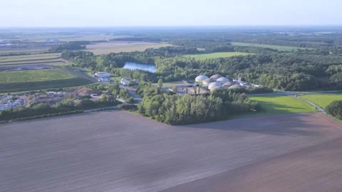 Large Renewable Biogas Facility with Multiple Digester Tanks in Rural Area Stock Footage 345301074