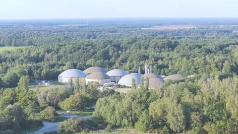 Large Renewable Biogas Facility with Multiple Digester Tanks in Rural Area Stock Footage 345301138