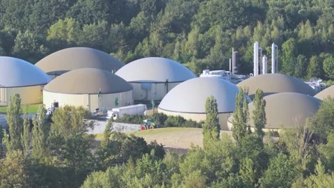 Large Renewable Biogas Facility with Multiple Digester Tanks in Rural Area Stock Footage 345301140