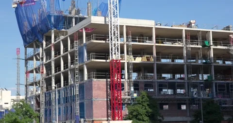 Large Residential Construction Project with Tower Cranes and Structural Stock Footage 336012067