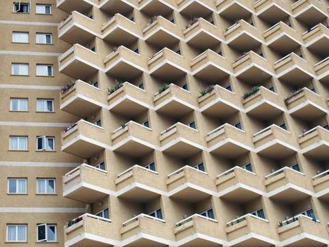  large residential highrise building with angular rows of balconies and ve... Stock Photos