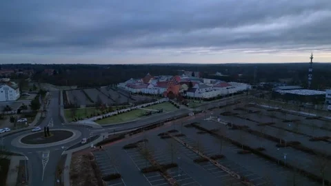 Large retail park designer outlet center in winter. Nice aerial view drone Stock Footage 344612131