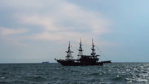 Large retro ancient sail ship vessel tourist attraction sailing slowly in calm Stock Footage 94972512