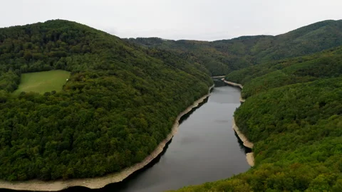 Large River in Mountains with Trees Stock Footage 257619533