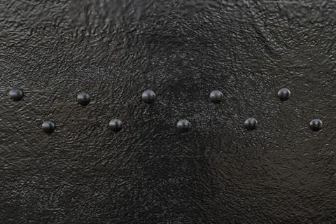 Large rivets on the black surface. Rivets on black metal Stock Photos