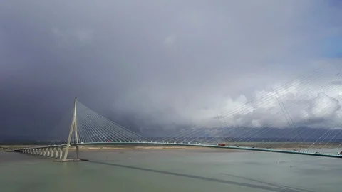 A large road bridge crosses a river. Stock-Footage 126506678