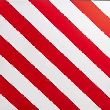 A large road sign displays a pattern of red and white stripes, warning driver Stock Photos