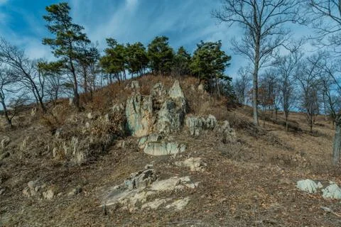 Large rock formations on mountainside. Stock Photos