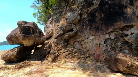 Large rock located on the seashore. Stock Footage 243279497