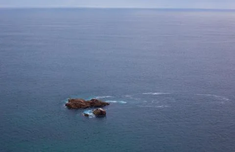 Large rock in the ocean. Cabo da Roca, the western point of Europe, Portugal Stock Photos