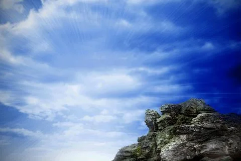 Large rock overlooking bright blue sky 스톡 일러스트