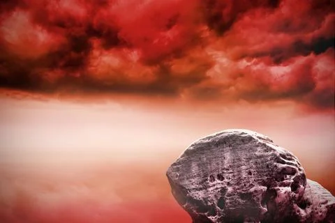Large rock overlooking red sky Stock Illustration
