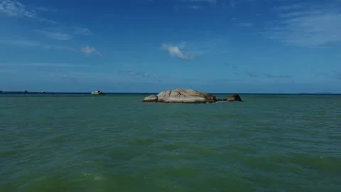 A large rock in the sea, Stock Footage 199164691