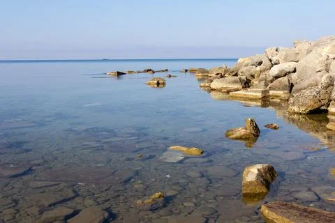 A large rock on the seashore Stock Photos