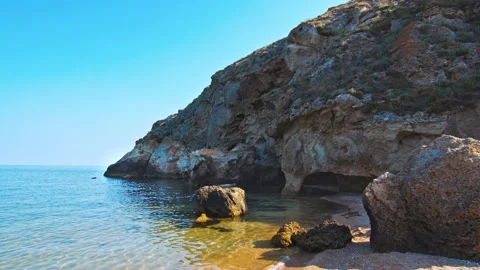 Large Rocks On The Beach Video stock 136219116