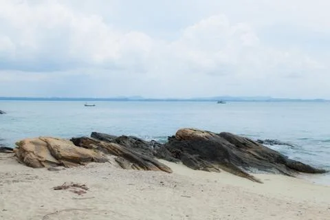Large rocks on the beach. Stock Photos