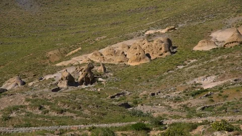 Large Rocks on Grass Hill Stock Footage 100868453