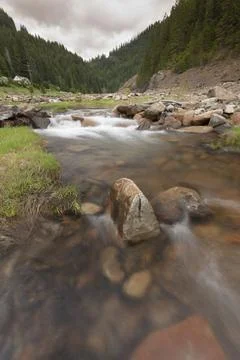Large rocks in the stream. Stock Photos