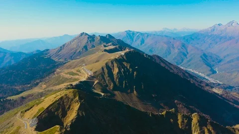 Large rocky mountain range with peaks and troughs, aerial view Video stock 118924775