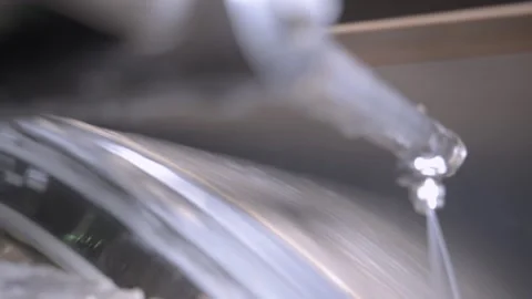 Large roller moves paper web in cooling sections of plant Stock Footage 303103955