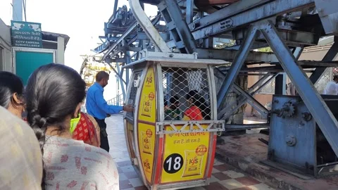 Large ropeway cable car mechanism with steel ropes and metal structures Stock Footage 146659396