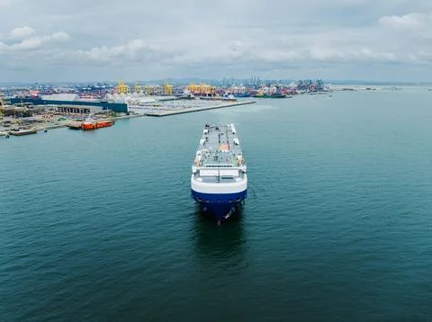 Large Roro Cargo Ship Navigating Into Industrial Shipping Port Harbor View Photos