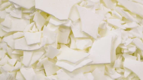 Large rotating dry soy textured wax flakes that highlight plant texture, natural Stock Footage 329100423
