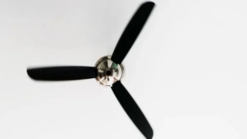 Large rotating electric ceiling fan. Traditional cooling or air conditioning Stock Footage 308569651