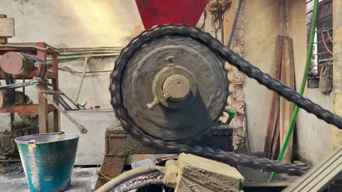 Large rotating gear wheel and chain mechanism in an industrial factory 스톡 동영상 346970976