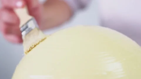 Large round dessert made of white chocolate with berry filling inside. Stock Footage 141712100