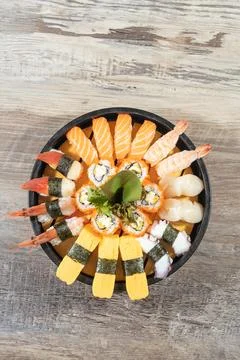 Large round platter of assorted sushi Stock Photos