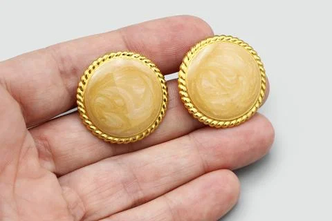 Large Round Studs Earrings, Beige Peach Enamel Swirl, Gold Tone Metal Metallic Stock Photos