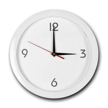 Large round white wall clock with white frame. The hands point to 3 o'clock.  스톡 사진