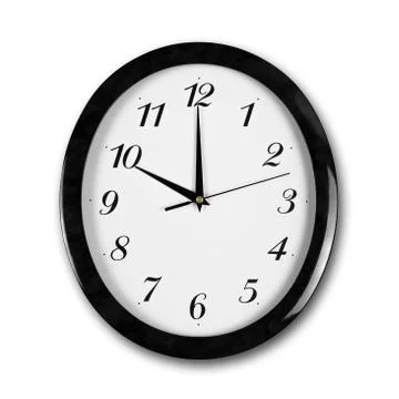 Large round white wall clock with black frame. The hands point to 10 o'clock. Stock-Fotos