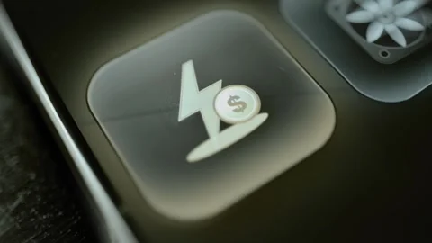 Large rounded button displays a lightning bolt Stock Footage 343369747