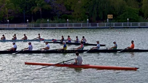 Large rowing crew training on Guadalquivir River in Seville 스톡 동영상 335815313