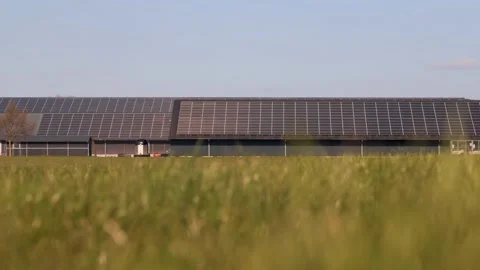 Large rows of solar panels on a farm barn Stock Footage 332712860