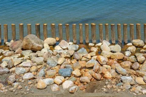 Large rubble on the beach Stock Photos