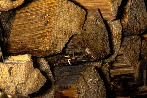 Large rural stack of firewood. Old firewood. Background. 스톡 사진