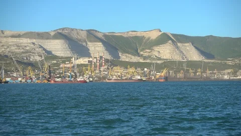Large Russian port, cargo and oil terminal. The ship enters the port. Stock Footage 89866982