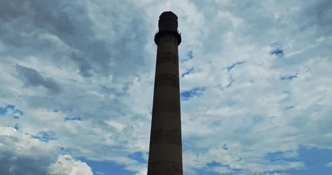 Large Rusted Abandoned Chimney From Soviet Era Against Cloudy Blue Sky Aerial Stock Footage 300444704