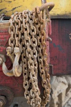 A large rusty chain with hooks. Close up. Background, texture. Stock Photos