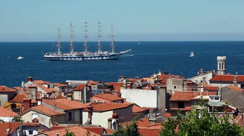 Large sailing ship anchored in the open sea near old city Piran, Slovenia. Video stock 52630866