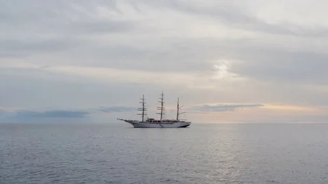 Large sailing ship on the atlantic ocean in a sunset. Timelapse Stock Footage 71780945