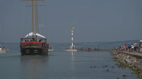 Large sailing ship leaving the harbour, stock video Stock Footage 94471559