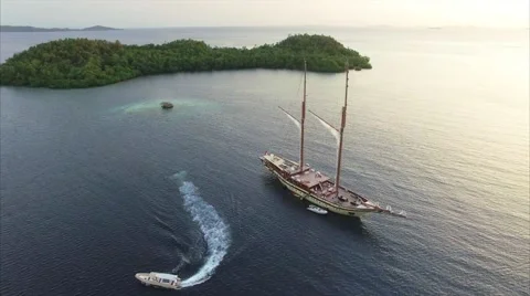 Large sailing ship in the sea at sunset Stock Footage 64131291