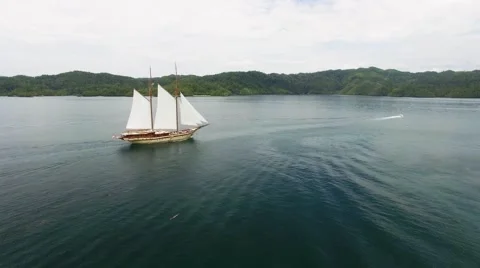 Large sailing ship in the sea at sunset Stock Footage 64139161