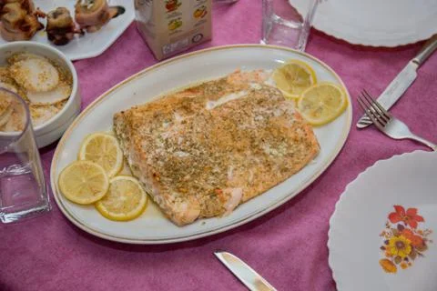 Large salmon steak on the table Stock Photos