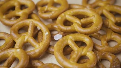 Large salt drops on pretzels close-up Stock Footage 85389207