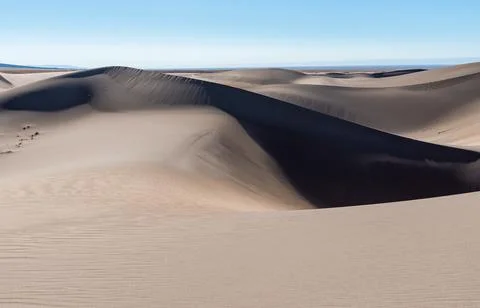 Large sand dune in the evening at sunset, shadow side, Great Sand Dunes Nat.. 库存照片